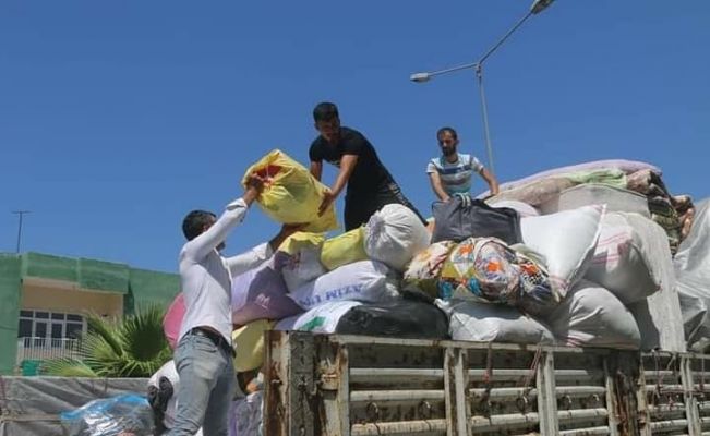 Kozan Ülkü Ocaklarından yangınzedelere 1 tır dolusu yardım