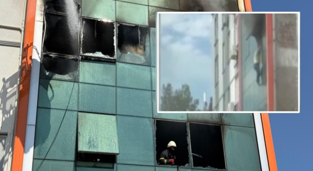 İş merkezinde panik anları: 2 işçi atlayarak canını kurtardı