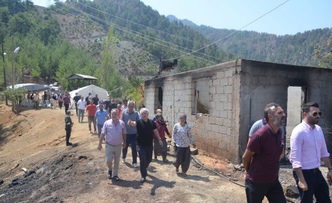 Başkan Özgan, yangın mağdurlarına yardım malzemesi dağıttı