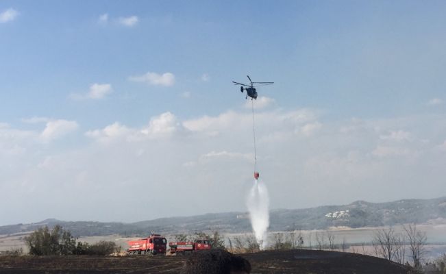 Kundaklanan ağaçlık alana 3 helikopter birden müdahale etti